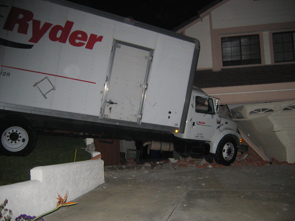 http://www.carnagecorp.com/pub/pictures/truck_vs_house.jpg